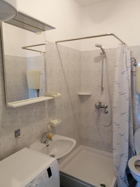 Kúpeľňa v ubytovaní Apartmani Dubravko