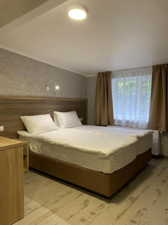Postel nebo postele na pokoji v ubytování Coffee Room