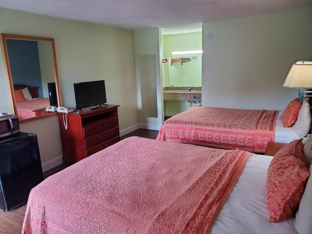Econo Inn - Ormond Beach - Комната королевы с двумя кроватями королевы - курение