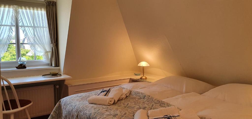 Postel nebo postele na pokoji v ubytování Haus Caluschi