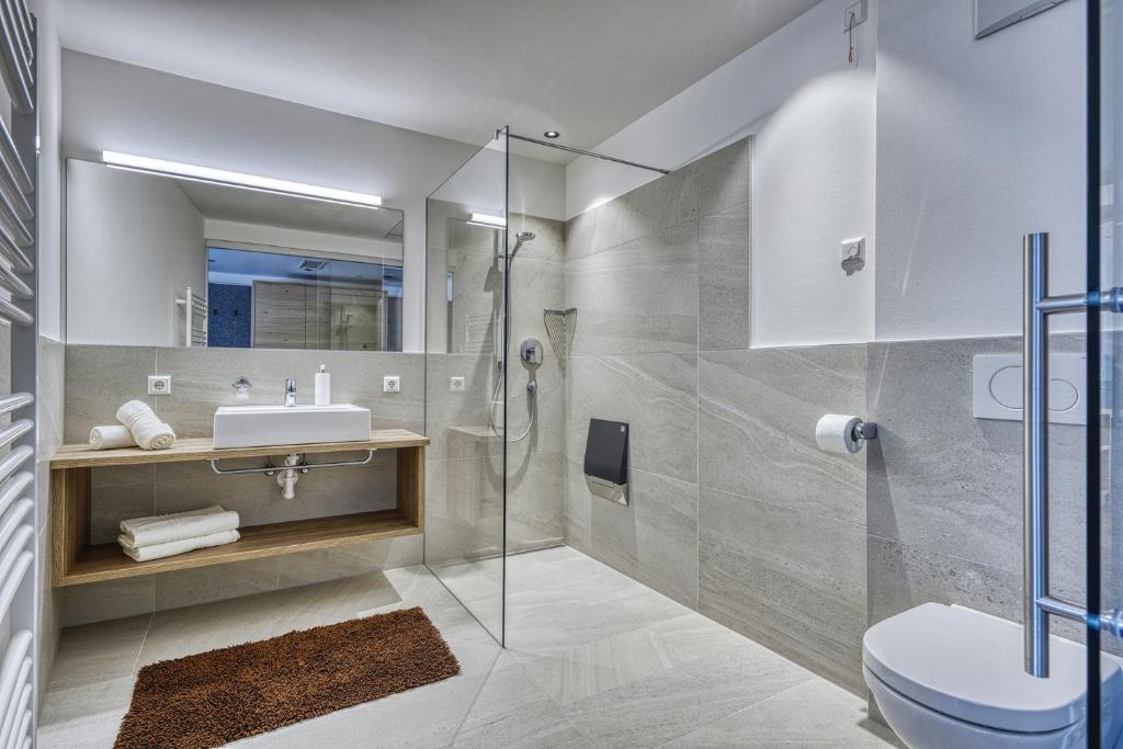 Koupelna v ubytování Das Mitterplarser Hotel