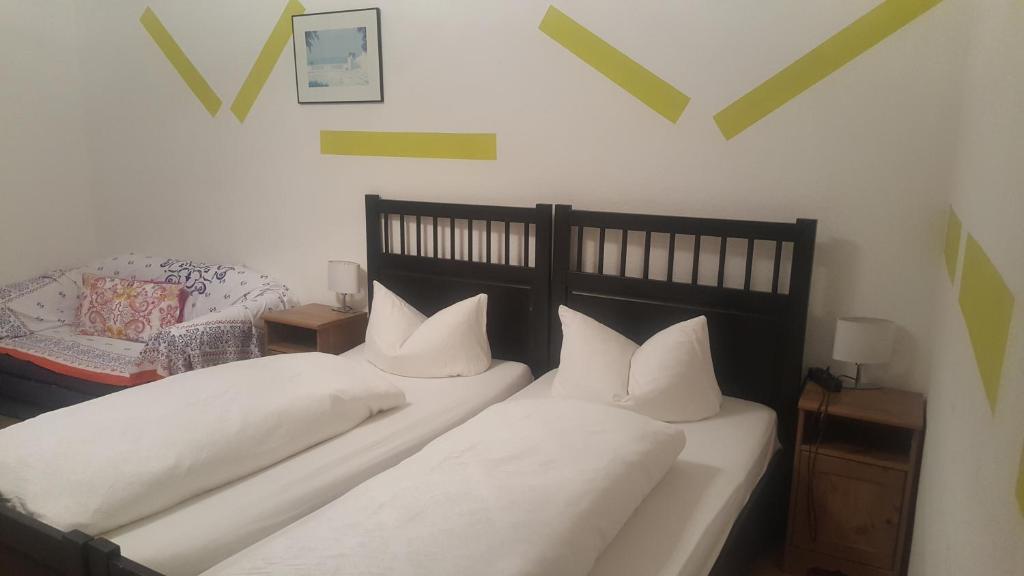 Postel nebo postele na pokoji v ubytování Hotel Heideklause