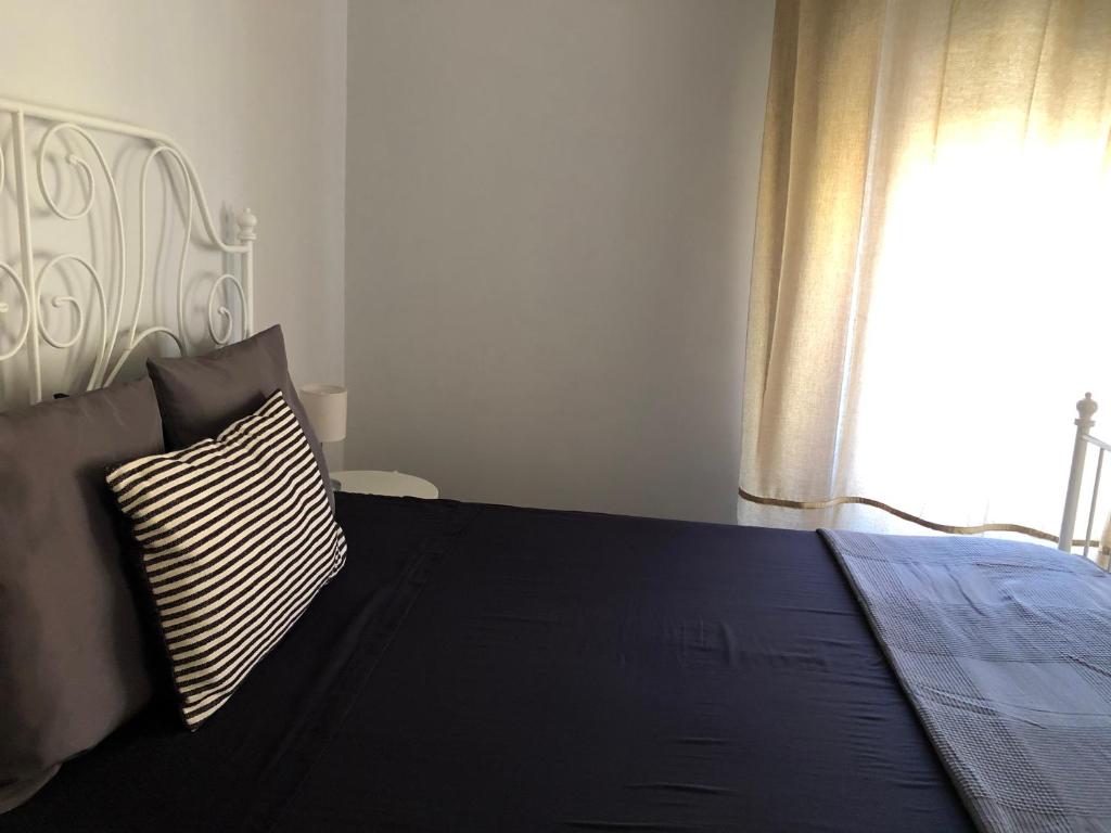 Postel nebo postele na pokoji v ubytování B&B Meliora Rooms
