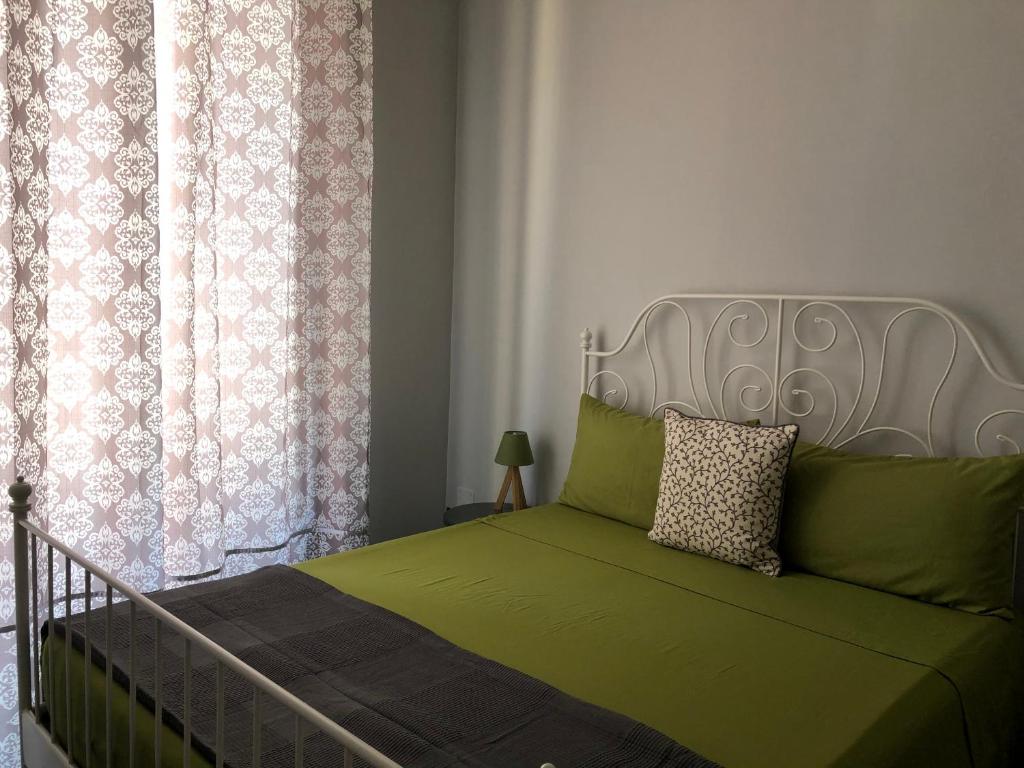 Postel nebo postele na pokoji v ubytování B&B Meliora Rooms