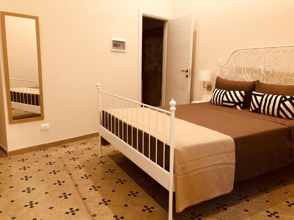 Postel nebo postele na pokoji v ubytování B&B Meliora Rooms