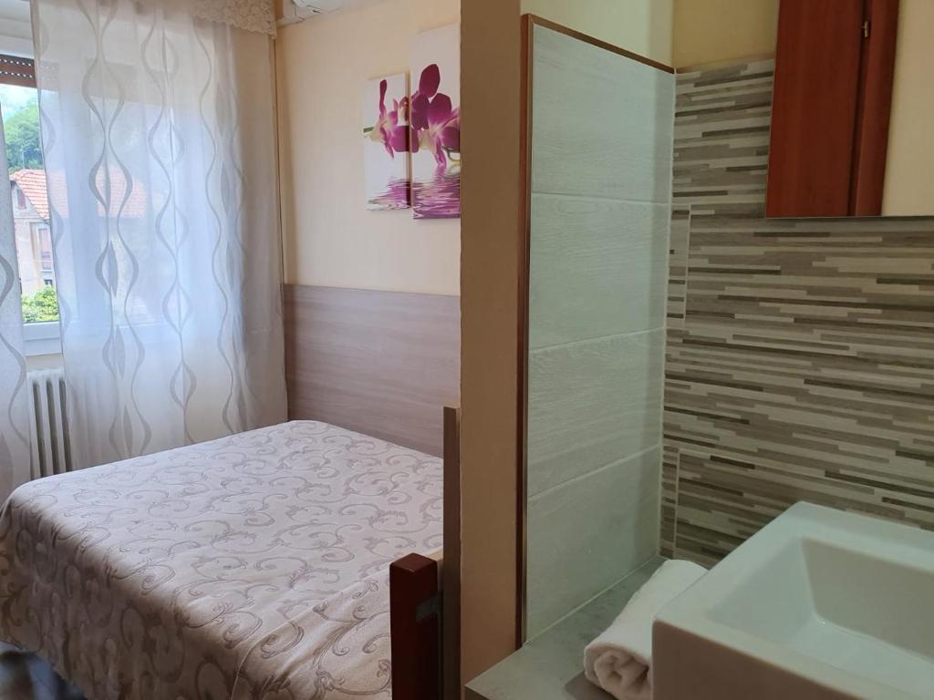 Koupelna v ubytování Albergo Paradiso