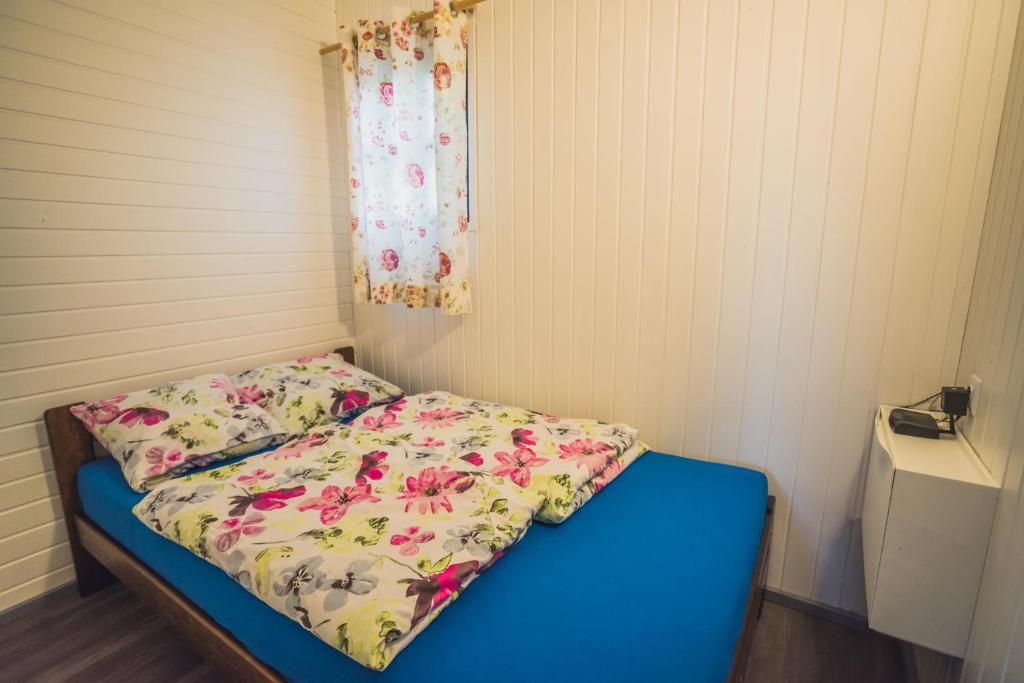 Postel nebo postele na pokoji v ubytování Domek Skowronek