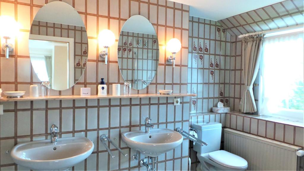 Koupelna v ubytování Haus Caluschi