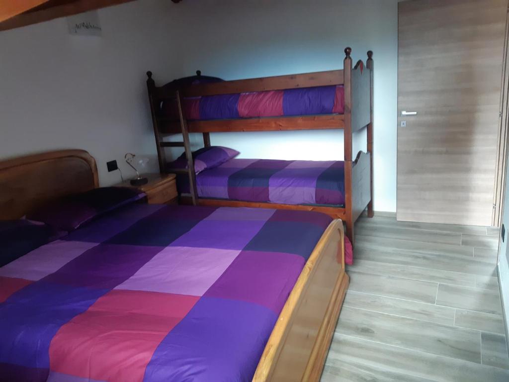 A bed or beds in a room at Casa Cheney