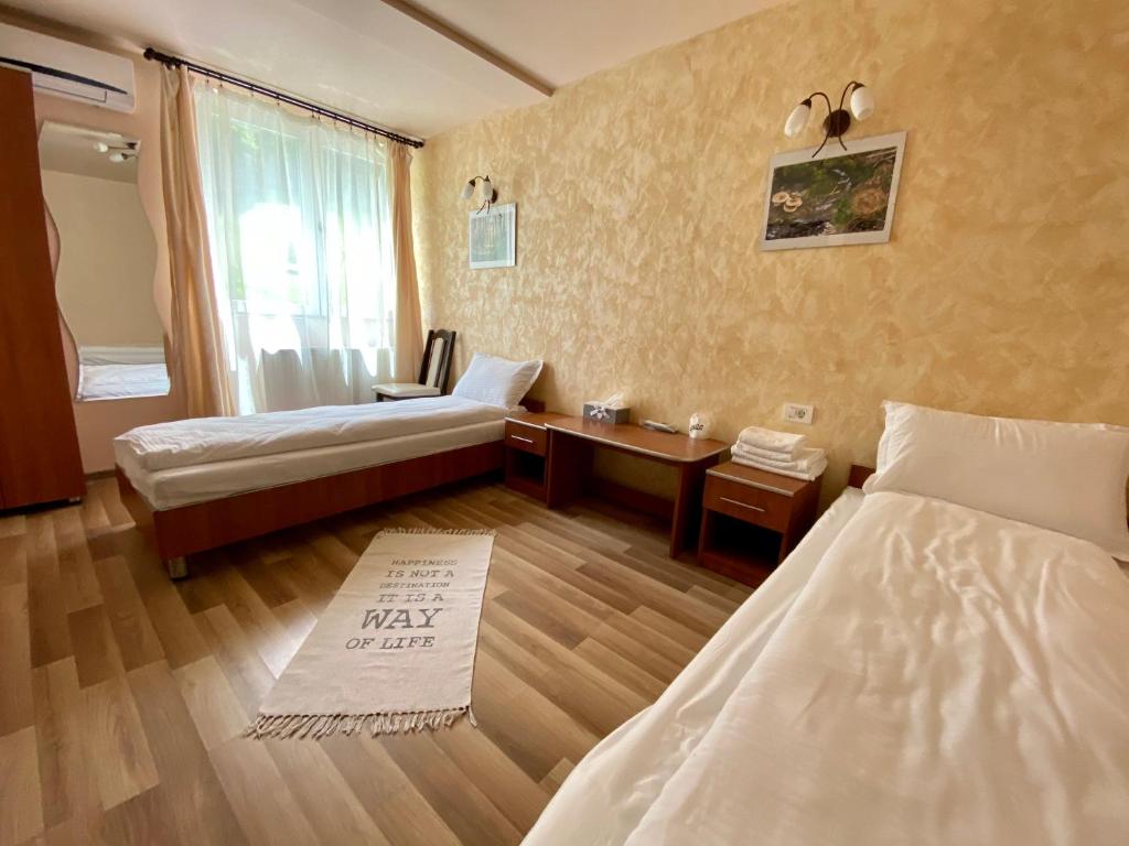 Postel nebo postele na pokoji v ubytování Pensiune Muntii Aninei