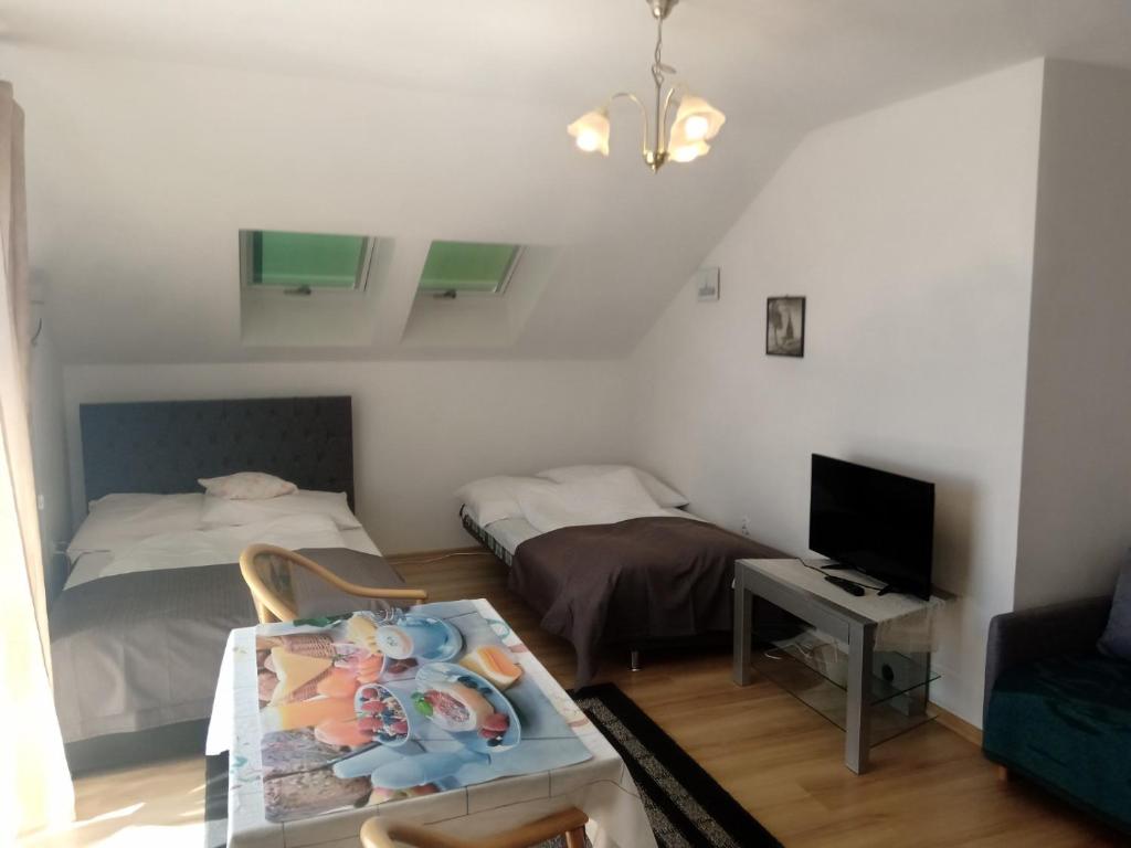 Postel nebo postele na pokoji v ubytování Mikadel