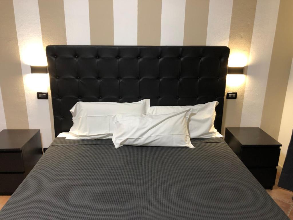 Posteľ alebo postele v izbe v ubytovaní B&B Il Viaggiatore