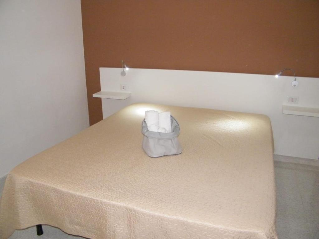Łóżko lub łóżka w pokoju w obiekcie Casa Rachele ad Alcamo Marina