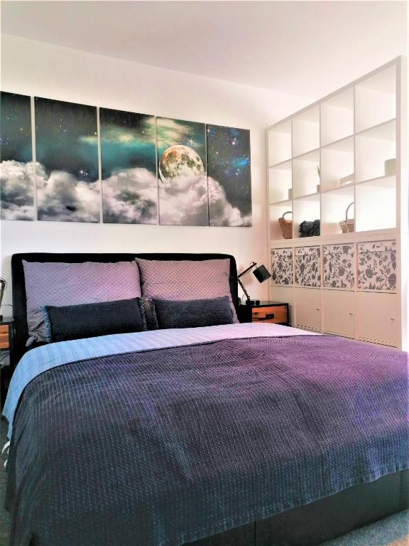 A bed or beds in a room at Apartman 11 MyMara