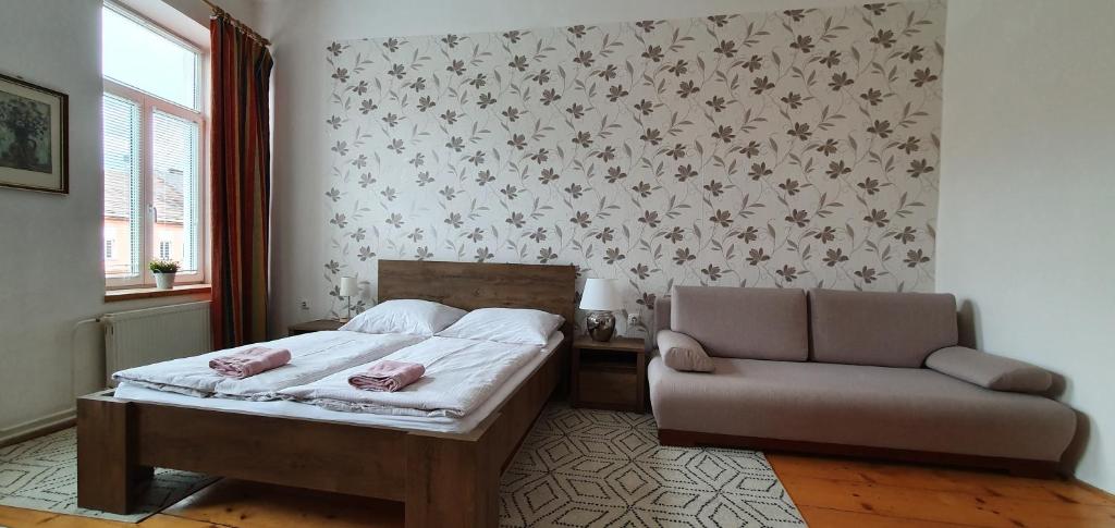 Un ou plusieurs lits dans un hébergement de l'établissement Penzion Zámecký park