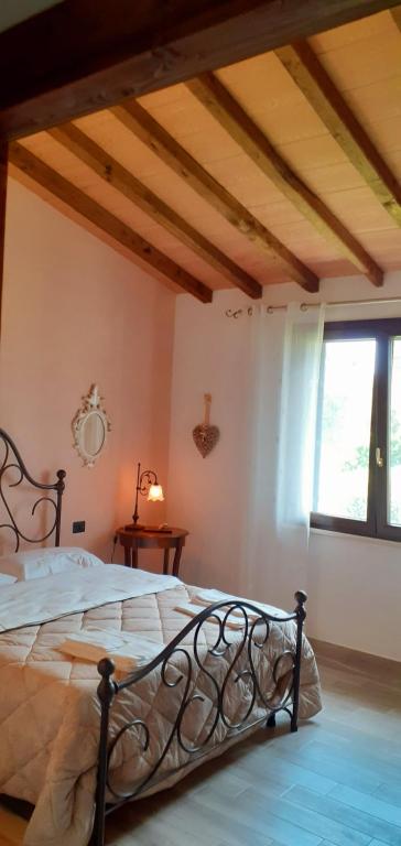 Posteľ alebo postele v izbe v ubytovaní Agriturismo Le Chiare Stelle