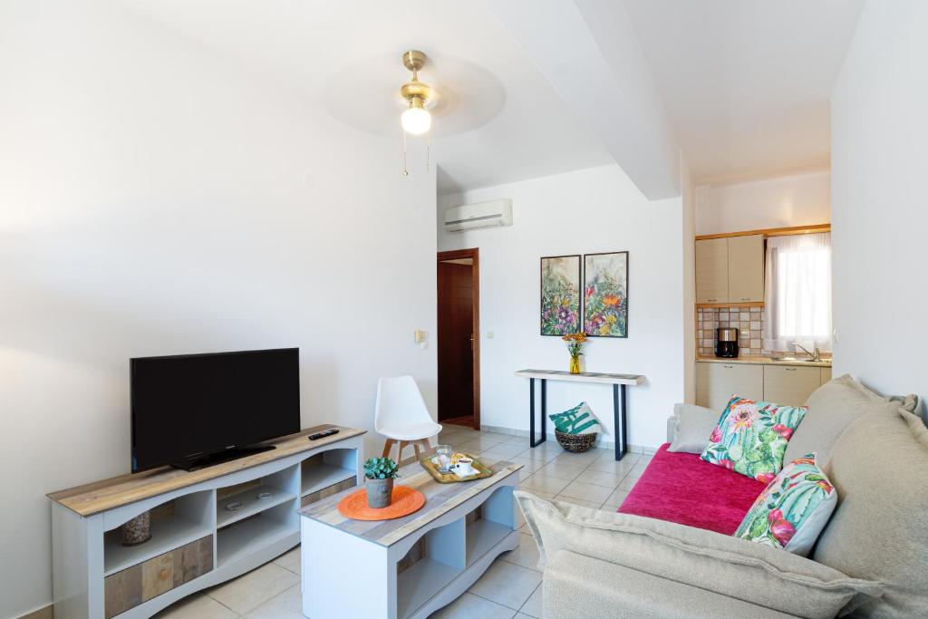 TV a/nebo společenská místnost v ubytování Areti InCreteble Cretan Residences Collection