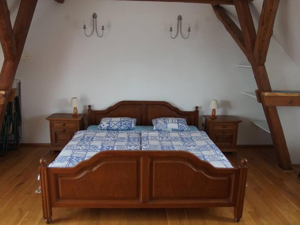 Postel nebo postele na pokoji v ubytování Siedlisko nad Rosiem