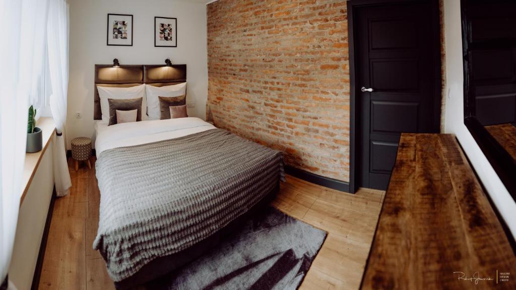 Posteľ alebo postele v izbe v ubytovaní apartament BB