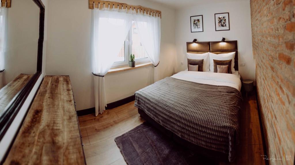 Posteľ alebo postele v izbe v ubytovaní apartament BB