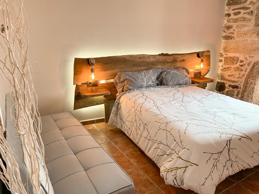 Ένα ή περισσότερα κρεβάτια σε δωμάτιο στο Casa As Fontes