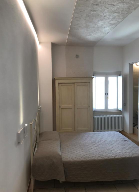 Postel nebo postele na pokoji v ubytování B&B Casa Dorsi