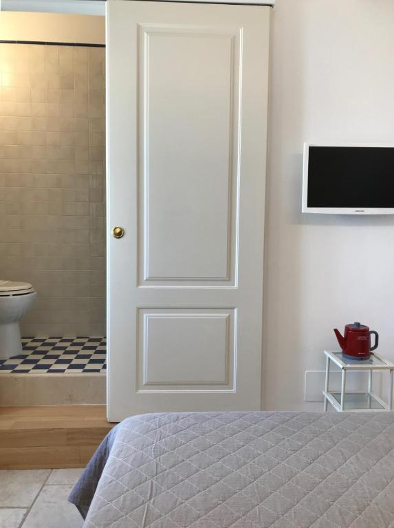 Postel nebo postele na pokoji v ubytování B&B Casa Dorsi