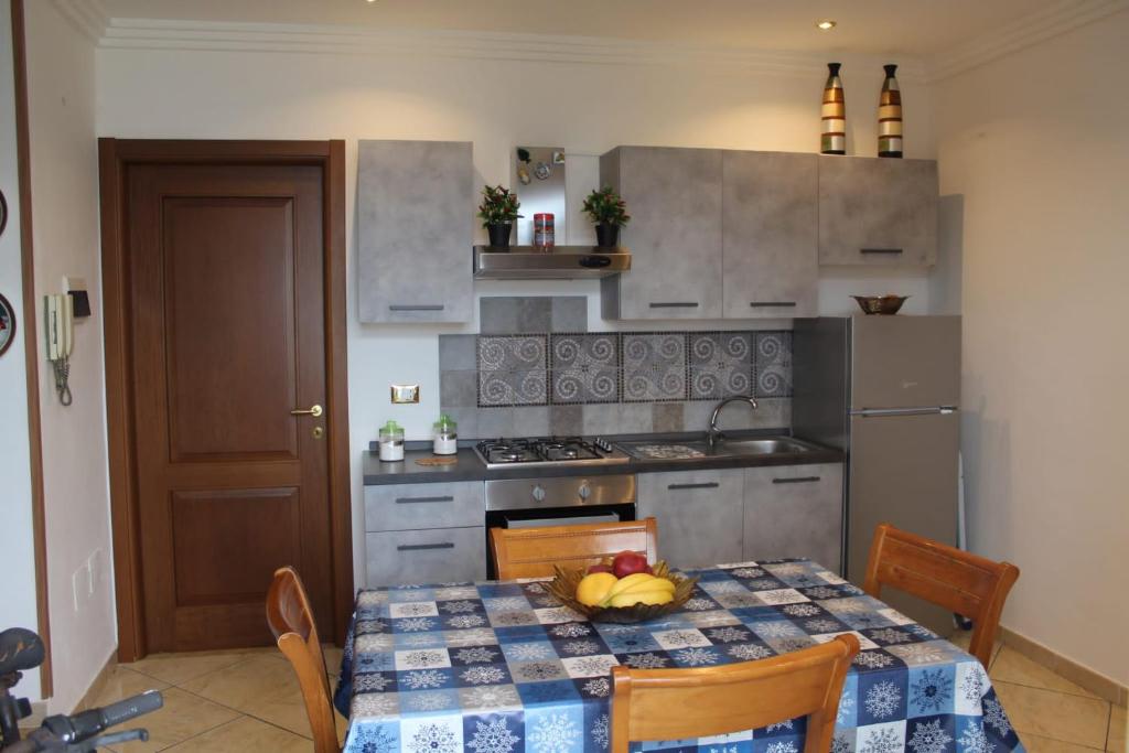 Kuchyňa alebo kuchynka v ubytovaní CupidoHouse a Mondello