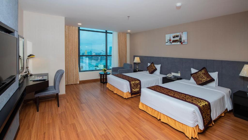 Phòng Deluxe 2 Giường Đơn Có Bồn Tắm Và Tầm Nhìn Ra Thành Phố