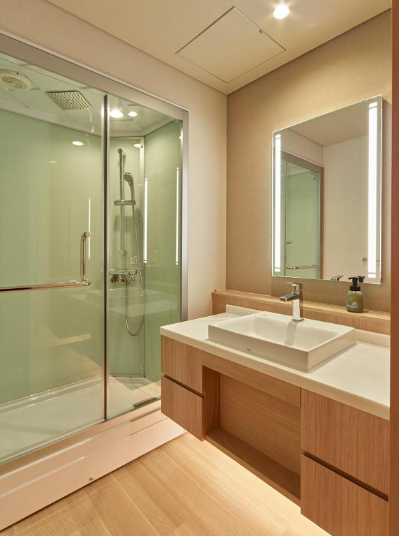 Koupelna v ubytování Saito Hotel