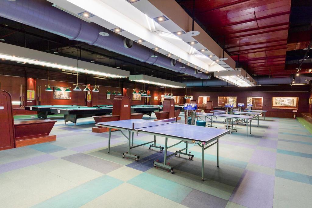 a large room with ping pong tables in it at Formosan Naruwan Hotel in Taitung City