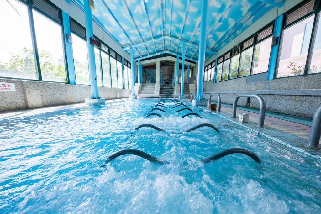 a large pool of water in a building at Formosan Naruwan Hotel in Taitung City
