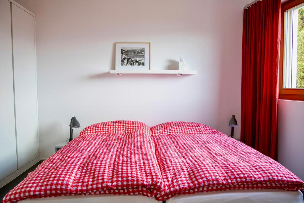 Postel nebo postele na pokoji v ubytování Ferienwohnung Crap Ner