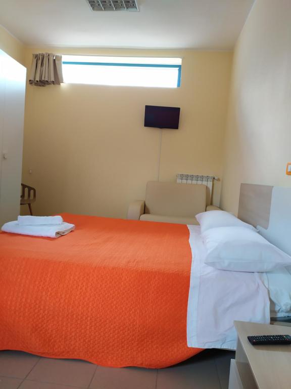 Postel nebo postele na pokoji v ubytování basilicata al volo