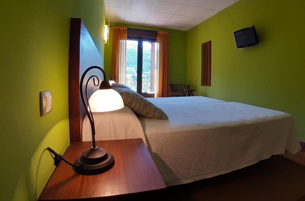 Postel nebo postele na pokoji v ubytování Hotel Rural Los Molinillos