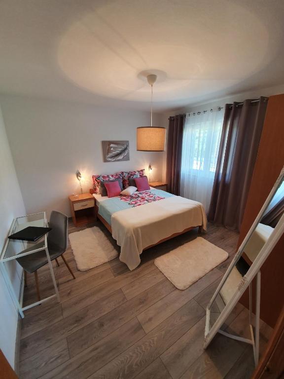 Postel nebo postele na pokoji v ubytování Apartments RELAX 2