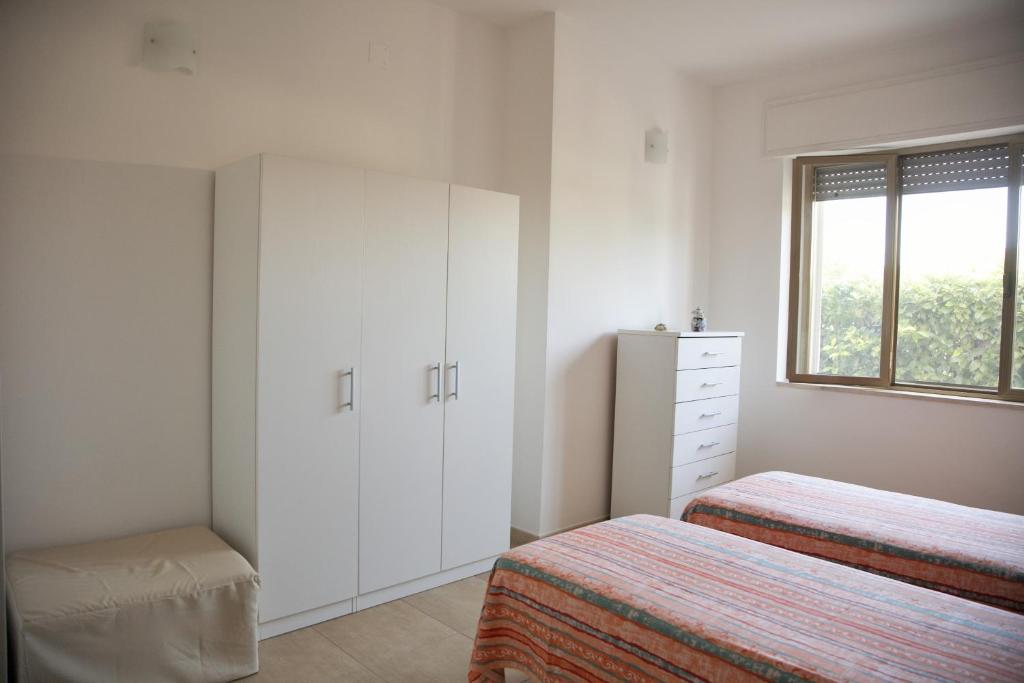 Postel nebo postele na pokoji v ubytování Casa Solento