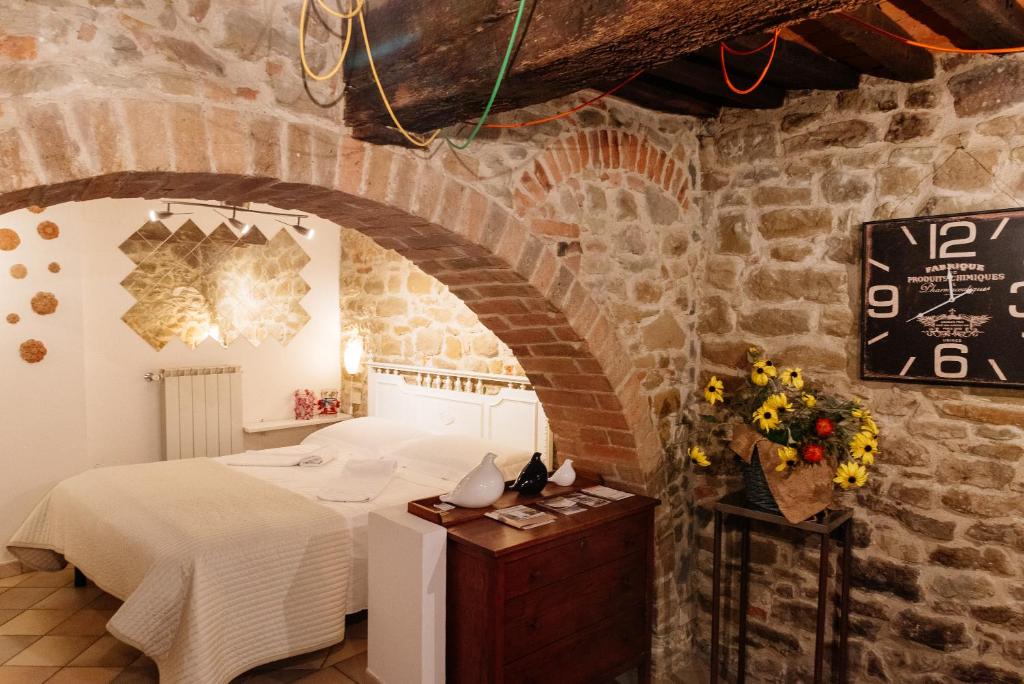 Postel nebo postele na pokoji v ubytování B&B Borgo di Oliveto - Appartamenti con Cucina
