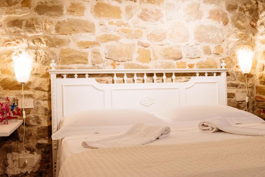 Postel nebo postele na pokoji v ubytování B&B Borgo di Oliveto - Appartamenti con Cucina