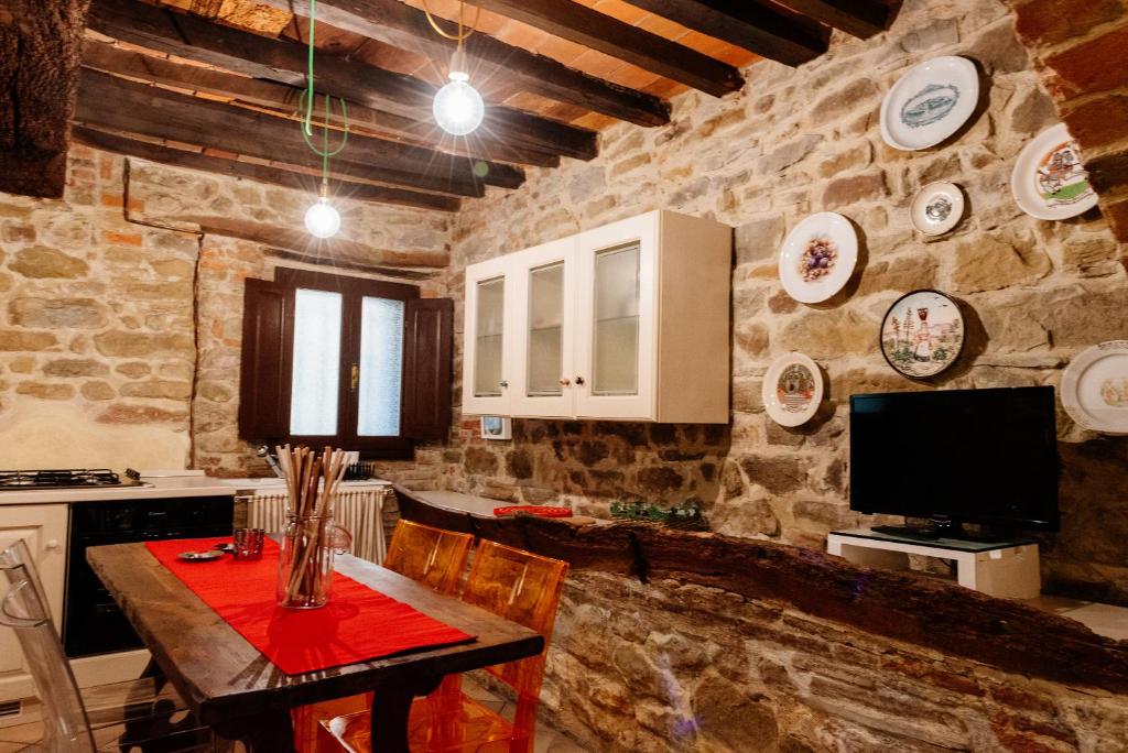 TV a/nebo společenská místnost v ubytování B&B Borgo di Oliveto - Appartamenti con Cucina