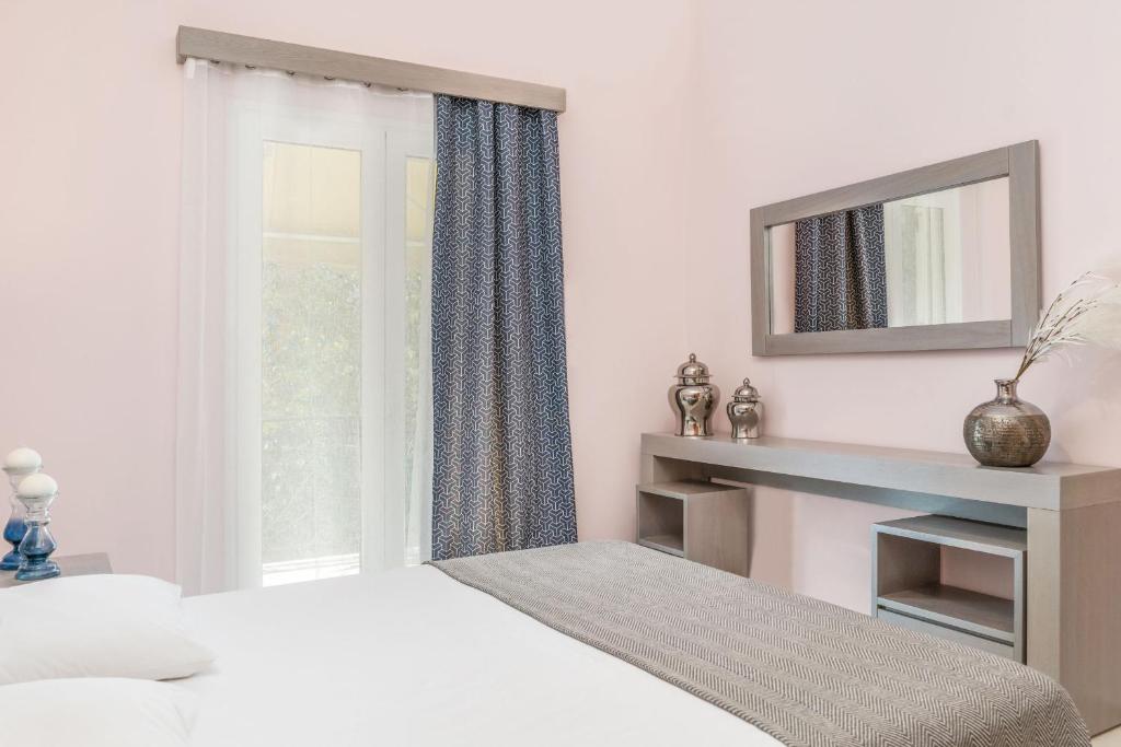 Posteľ alebo postele v izbe v ubytovaní Niver Luxury Suites