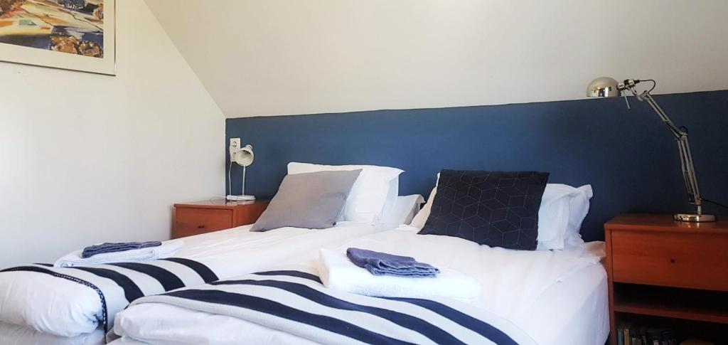 Postel nebo postele na pokoji v ubytování Refurinn Reykjavik Guesthouse