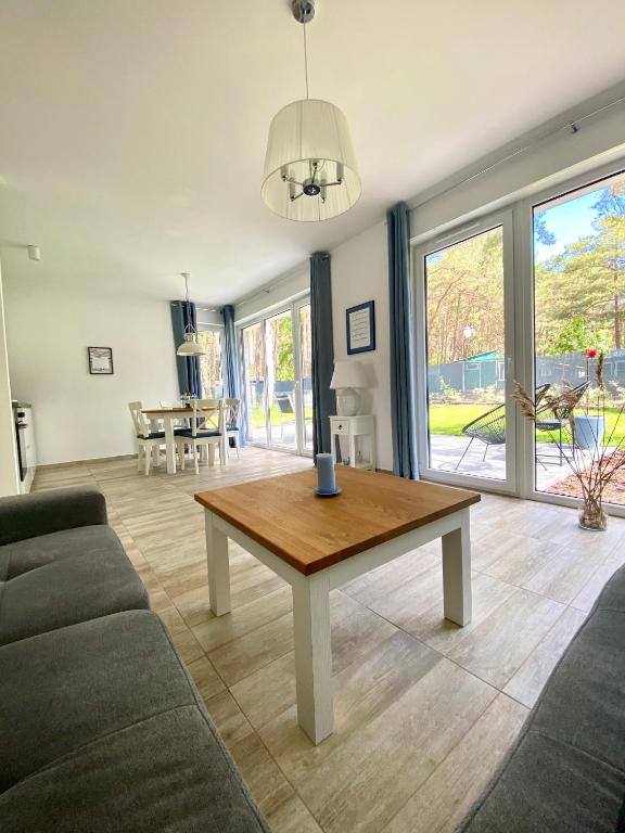 Posezení v ubytování Sosnowe Zacisze Apartament