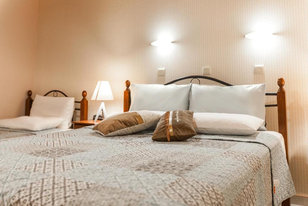 Postel nebo postele na pokoji v ubytování Hotel Electra
