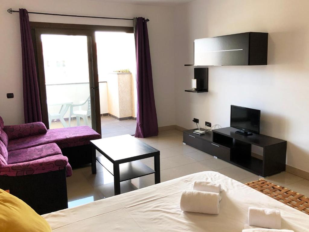 TV a/nebo společenská místnost v ubytování Cotillo Ocean View