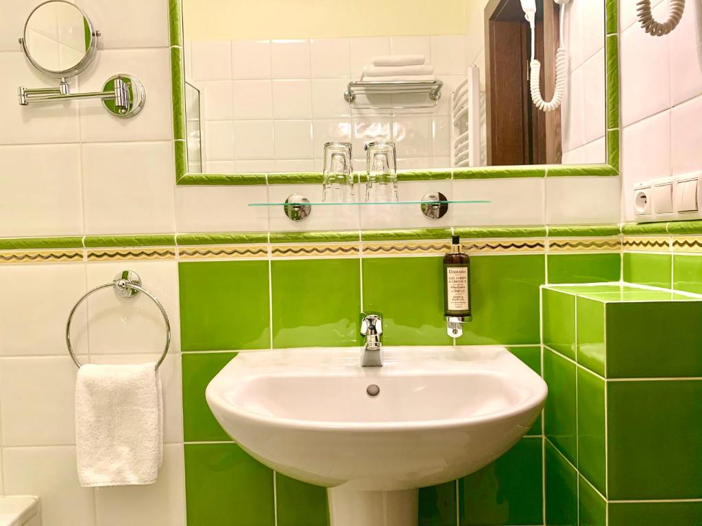 Koupelna v ubytování Hotel Abácie & Wellness