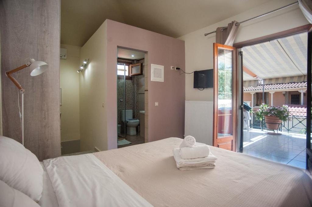 Postel nebo postele na pokoji v ubytování Monteduca Apartments