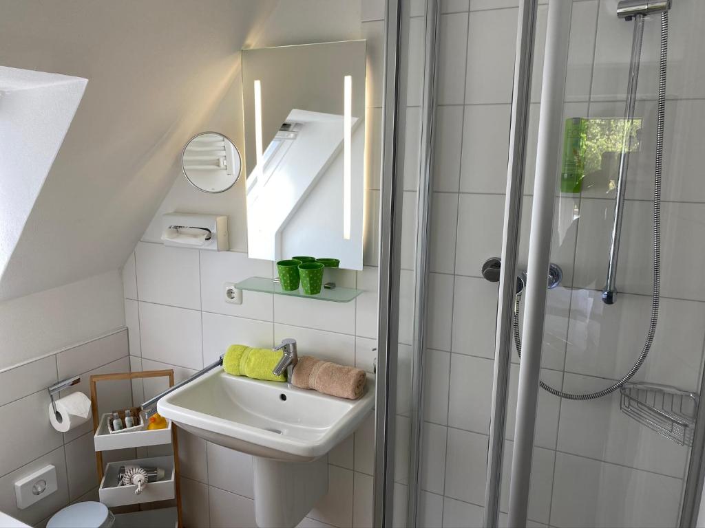 Koupelna v ubytování Hotel Garni Dünennest