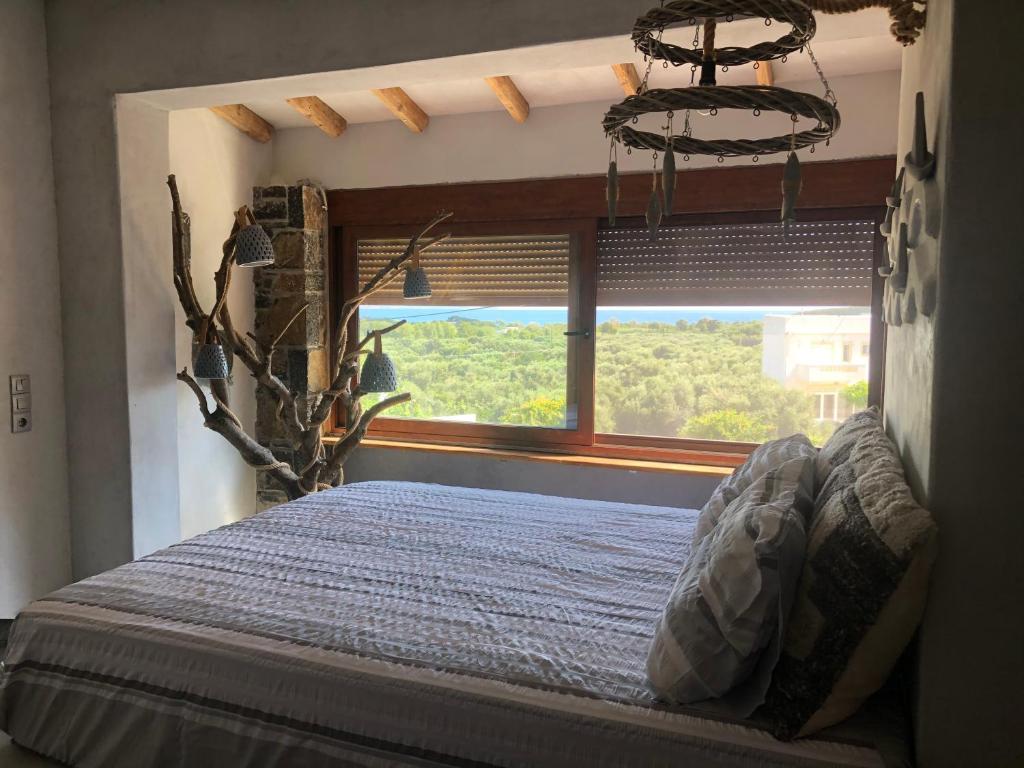 Postel nebo postele na pokoji v ubytování Istron Breeze Isla