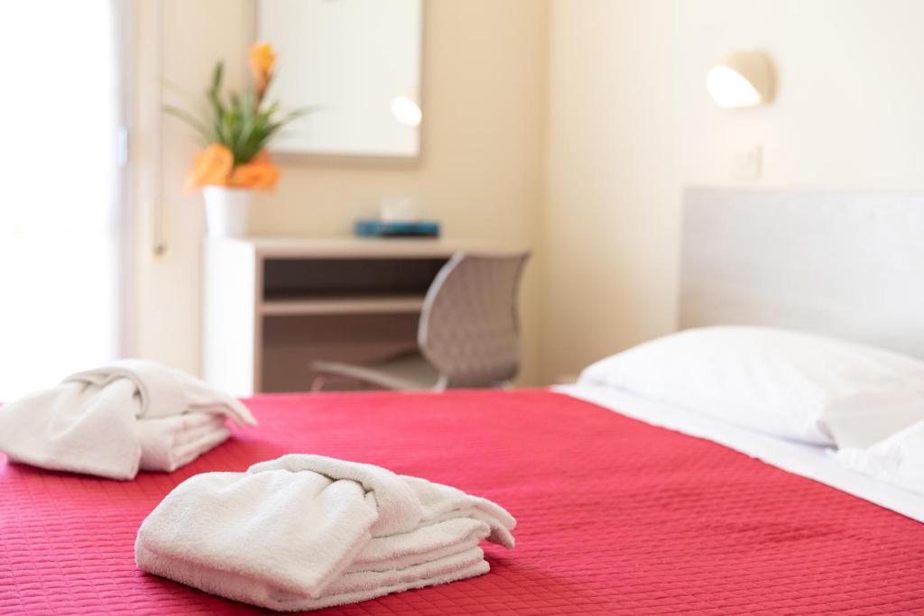 Postel nebo postele na pokoji v ubytování Hotel Lem
